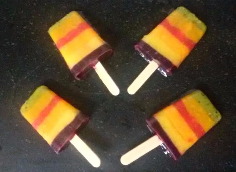 Holi special kiddie treat: Whole fruit Rainbow Popsicle
