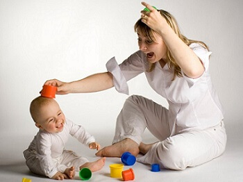 Image of Mom playing with her child